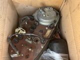 a cardboard box with a motor inside of it