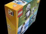 a box of legos sitting on a black surface
