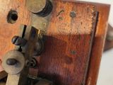 a close up of a violin with a wooden case