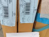 two packages are stacked on top of each other in a box