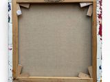 an image of a picture frame with paint splatters on it