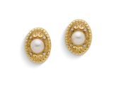 une photo d'une paire de boucles d'oreilles en or et perles