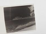 a polaroid picture of a person riding a skateboard