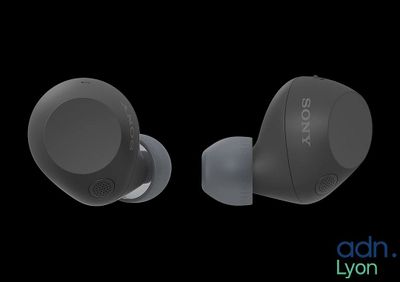 a pair of earphones sitting on top of each other