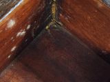 a close up of a wooden box on a table