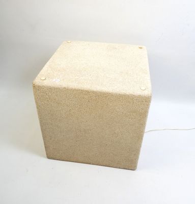 the box is made out of cardboard and has a wire attached to it