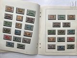 a lot of stamps on the pages of a book