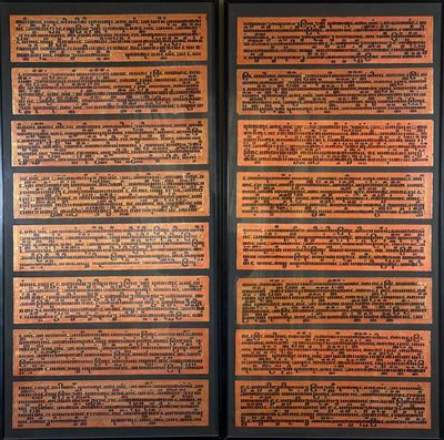 an image of a wooden panel with writing on it in front of a window