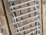 a bunch of screws that are on a pallet