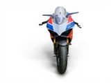 the motorcycle is red, white, and blue with a white background