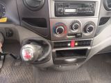 a car dashboard with a steering control and other items in it