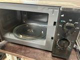 a microwave that is sitting on top of a counter