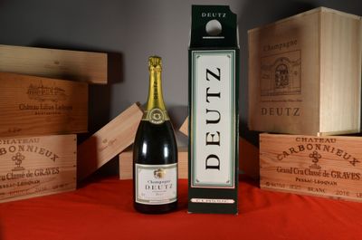 a bottle of wine and a box of wine on a table