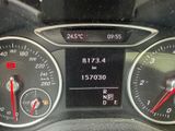 a close up of a car dashboard with a speedometer
