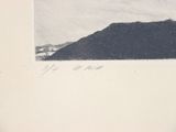 a black and white photo of a mountain in the snow