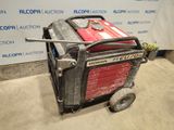 a small portable generator that is sitting on the floor