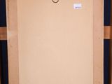 an easel with a blank canvas on top of it in front of a blue wall