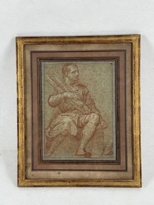 an old picture of a man holding a rifle in his hand