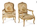 pair of louis xv style armchairs with floral upholstered upholstered cushions