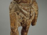 an image of a statue of a man holding a baseball bat