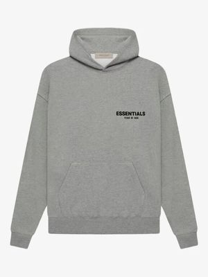 un sweat-shirt gris sur lequel est imprimé le mot « essentials »