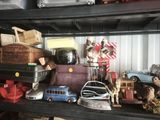 a shelf full of toys and other items on a shelf