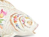 an image of a fish shaped vase on a white surface