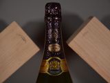 a bottle of wine that is sitting on a table