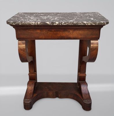 Console en acajou et placage d'acajou reposant sur deux pied…