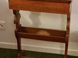 a small wooden table with a drawer underneath it