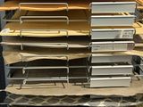 a lot of boxes that are stacked up on a shelf
