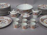 a table with a lot of plates and cups on it