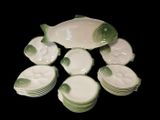 a lot of dishes that are sitting on a table