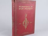 the front cover of a red book with a drawing of a bird on it