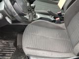 a picture of a car with a dirty seat and steering wheel