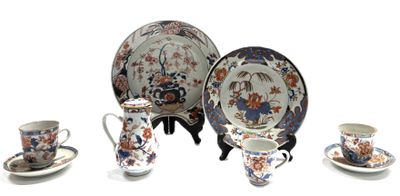 a group of plates and cups on a table