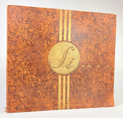 a brown and gold book with a bird on the cover