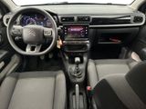 the interior of a car with a steering wheel, dashboard, and dash board