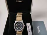 the watch is in a box with a tag on it