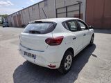 a white car that is parked in a parking lot