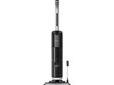 une photo en noir et blanc d'une brosse à dents posée sur un support