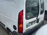 a white van that is parked in a parking lot