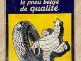 a michel tire sign on the wall of a building
