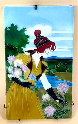 a picture of a woman with flowers in her hand