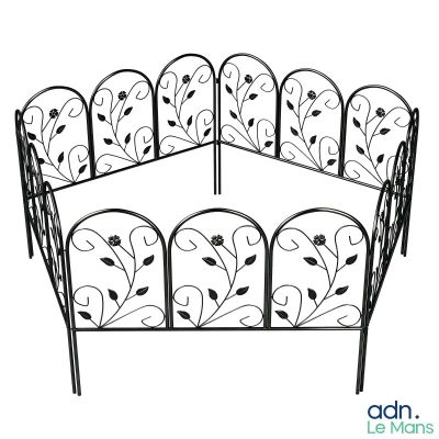 black wrought iron bed frame with floral design and curved headboard