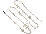 a close up of a rosary on a white background
