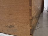 a wooden box that is sitting on a counter