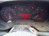 the dashboard of a car with a speedometer and other gauges