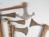 a lot of old tools that are laying on a table