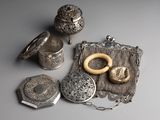 a lot of silver items that are on a table